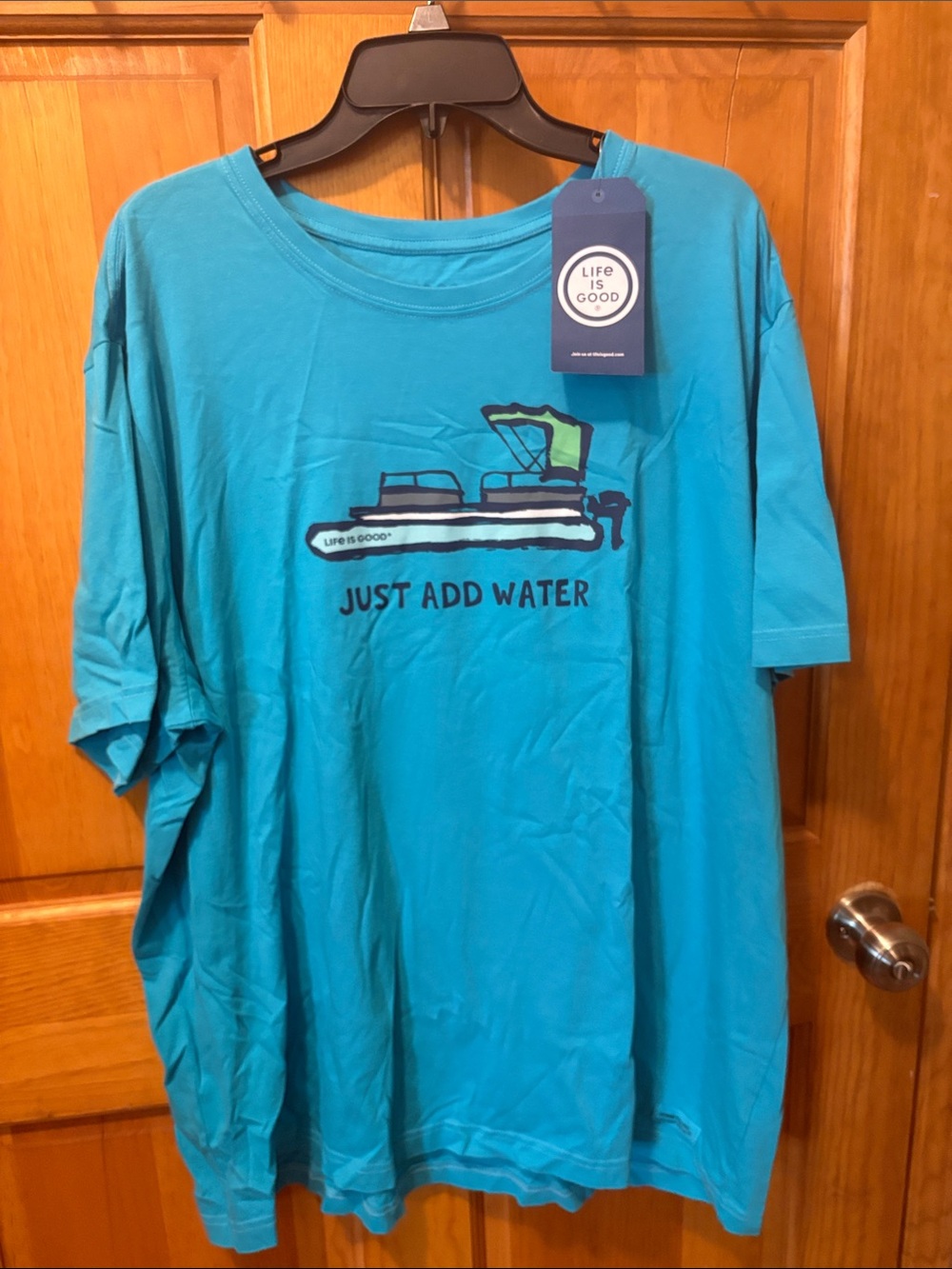 Life Is Good Men's Short Sleeve Tee in Teal Blue - "Just Add Water" Boat Graphic